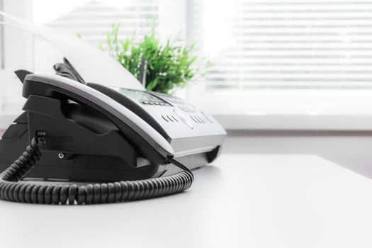 Black fax machine tool close up, business concept photo