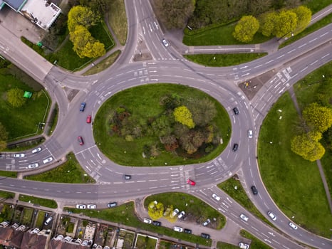 Aerial view of traffic flowing through roundabout in United Kingdom photo