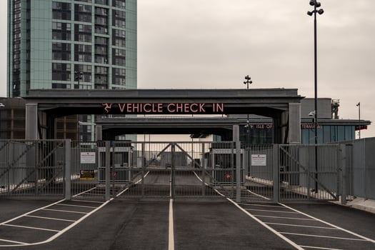Vehicle check in area at liverpool ferry terminal showing closed barriers and signage photo