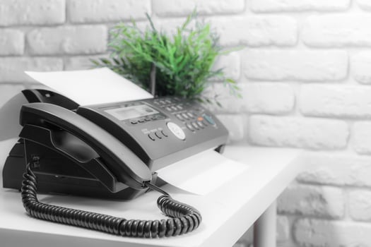 Fax machine close up in an office photo