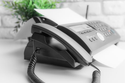 Fax machine close up in an office photo