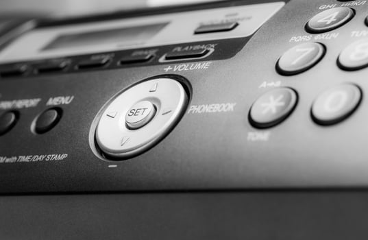 Black fax machine tool close up, business concept photo