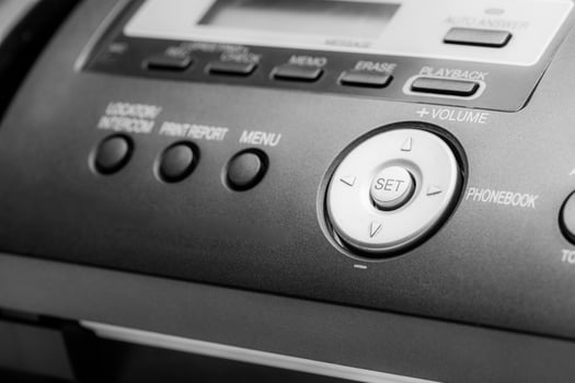 Black fax machine tool close up, business concept photo