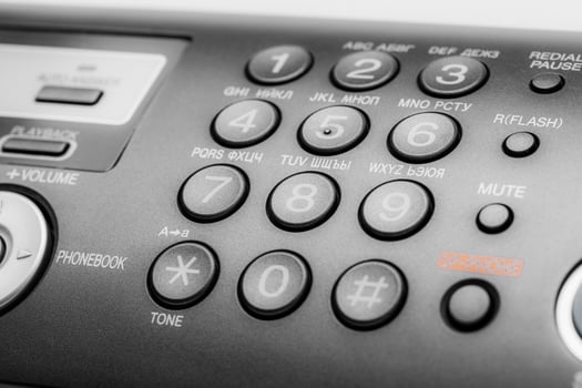 Black fax machine tool close up, business concept photo
