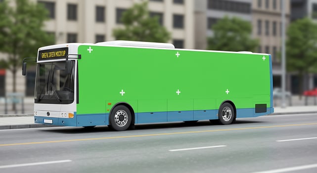 A green bus is driving down the street photo