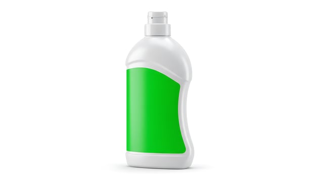 A green bottle of cleaning spray on a white background photo