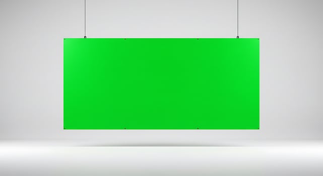 Green screen hanging on a wall with a white background photo