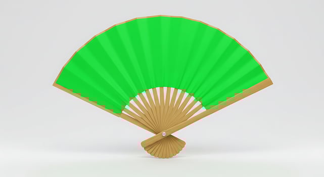 A green fan with a wooden handle on a white background photo