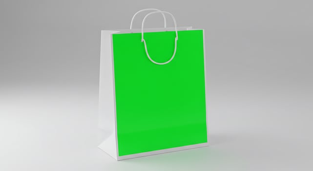 Green shopping bag on white background photo