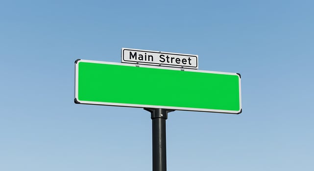 A green sign with a white background photo