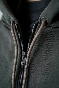 Premium Hoodie Zipper Detail and Drawstrings for Quality Fashion Display photo