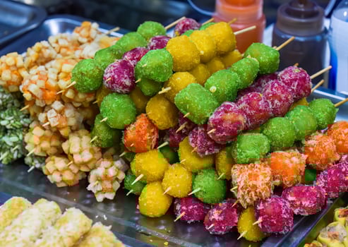 Many snacks and seafood in vietnamese night market in food market photo