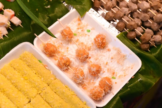 snack and seafood in vietnamese night market in food festival photo