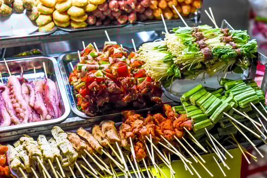 Many snacks and seafood in vietnamese market in Da Lat photo