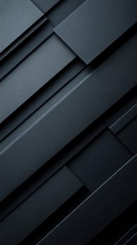 Textured layers of dark materials create a striking visual effect in an abstract composition photo