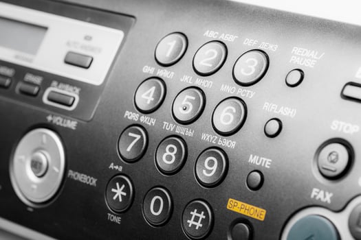 Fax machine close up in an office photo
