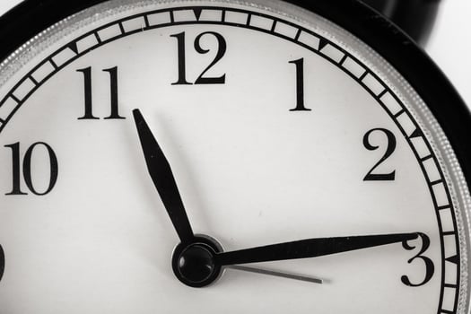 Close up of a black vintage alarm clock photo