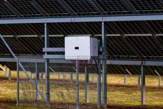 Solar Panel Installation with Electrical Box and Red Straps photo