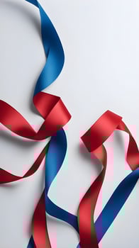 A detailed shot of intertwined red and blue silky ribbons, leaving space for Presidents Day content. photo