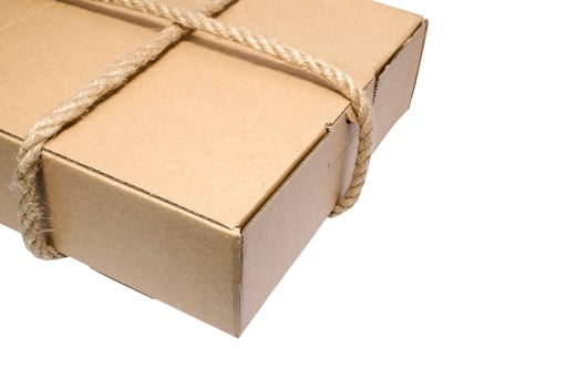 Cardboard box tied with a rope photo