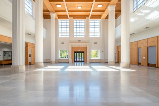 Spacious interior with tall columns and natural light. photo