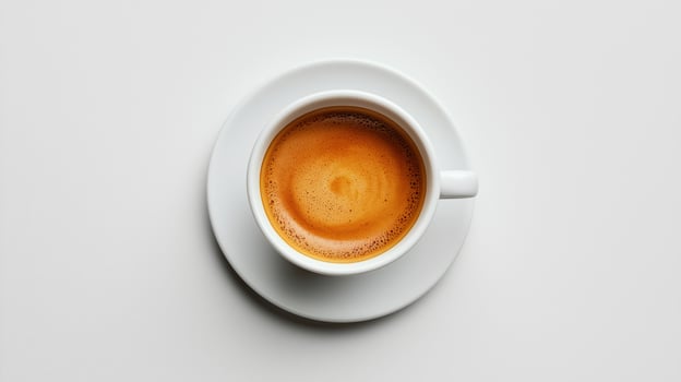 Close-up of a white coffee cup filled with fresh espresso on a saucer photo