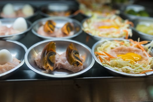 Many of dim sum in showcase at restaurant photo