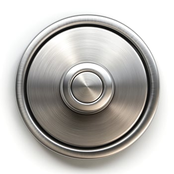 Close-up of a stainless steel circular button on a white background. photo