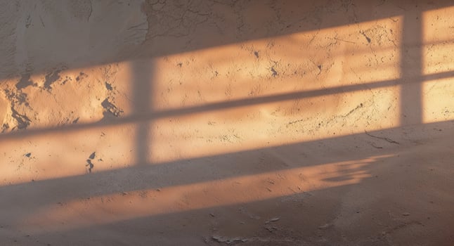 A window with a sun shining through it photo