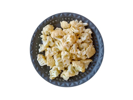 Fresh Cauliflower in the basket isolated on white background photo