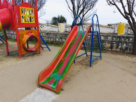 kids swings sliders in the park photo