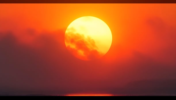 Sunset over the ocean photo
