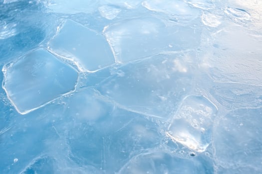 Ice texture. Close-up of frozen water surface. Winter background photo