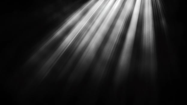 Rays of light pierce the darkness, illuminating a mysterious space. A visual study in contrast, texture, and abstract composition. photo