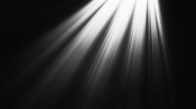 Rays of light cut through the darkness in a striking display, creating a dramatic and ethereal visual effect. Powerful illumination. photo