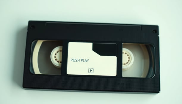 Black VHS Cassette Tape on White Background photo