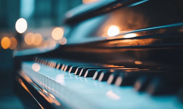 Close-up of piano keys at night with bokeh lights. photo