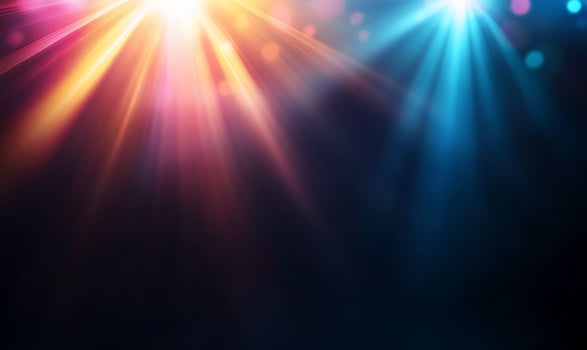 Colorful stage spotlights illuminate dark background. photo