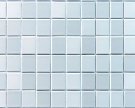 Grid of Light Blue Ceramic Square Tiles photo