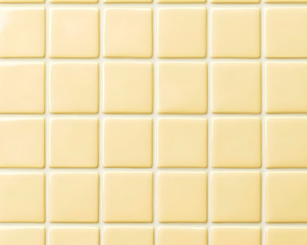 Grid of Pale Yellow Ceramic Square Tiles photo