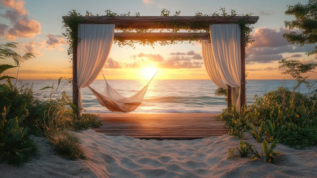 Hammock hanging on tropical beach at sunset under wooden frame with curtains photo