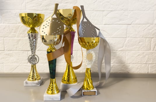 Trophy for champion. Gold winner cup for equestrian sport photo