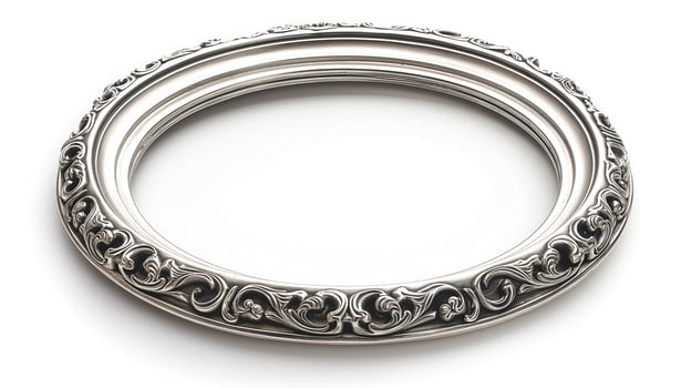 Elegant ornate silver picture frame showcasing intricate floral designs. photo
