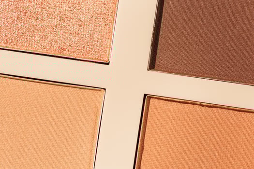 Vivid colored eye shadow makeup palette close up, colorful swatches cosmetic and beauty product, shiny eye shadow in beige package, aesthetic background textures powder for eye cosmetics photo