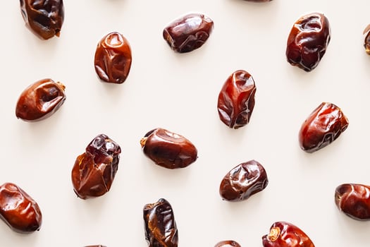 Organic Dates Flat Lay on Beige photo