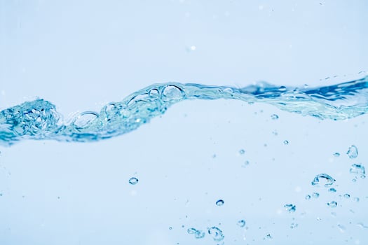 Water splash isolated on white background, Air Bubbles Float Up Under Blue Water. Pure Water Wave, Oxygen Relaxation. Blue bubbles Wate photo