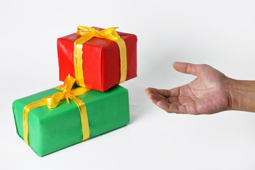 Golden Ribboned Presents in a Man's Grasp photo