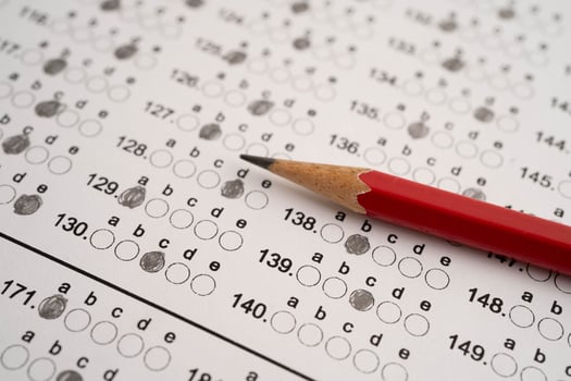 Answer sheets with pencil drawing fill to select choice, ed photo