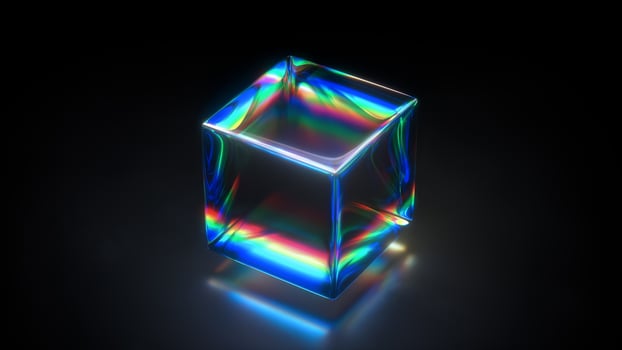 A Stunningly Colorful, Exquisite Glass Cube That Features a Beautiful, Vibrant Rainbow Reflection photo