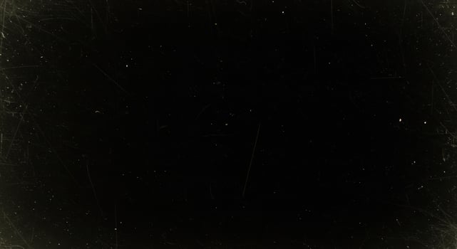 An old black and white photo of a black background